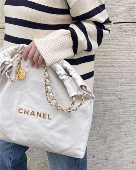 chanel 22 handbag white|chanel denim bag 2022.